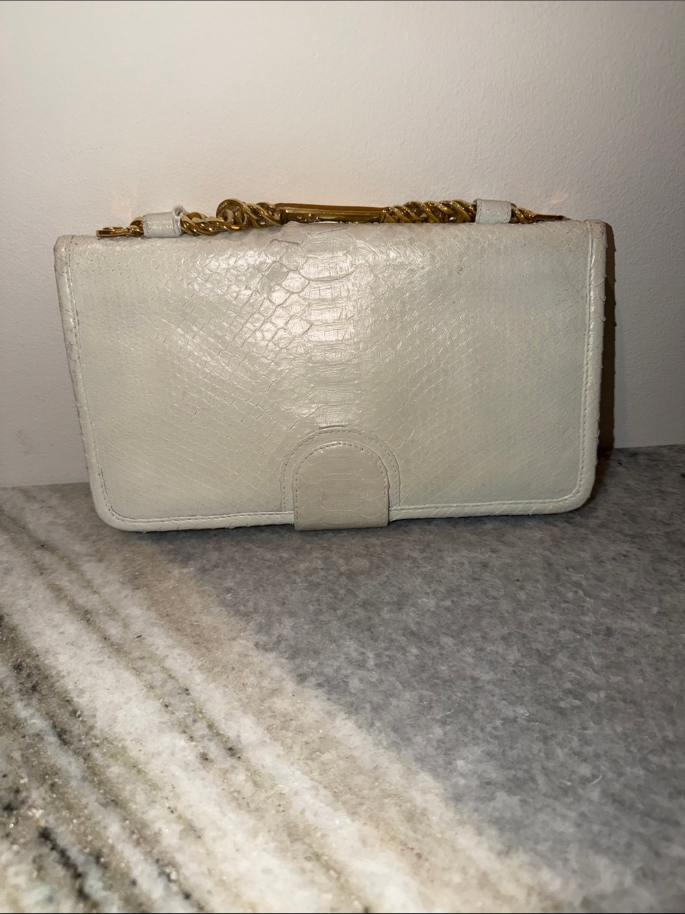 Cream Textured Wristlet Clutch with Gold Chain Strap